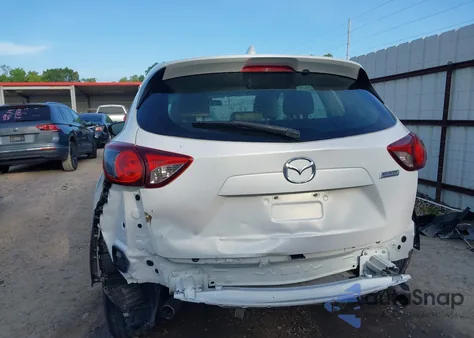 2015 Mazda Cx-5 Sport from USA, damaged, VIN JM3KE2BE4F0504131